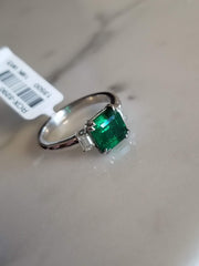 Green Emerald Ring with Baguette Diamond Sides