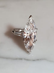 7.22ct Natural Marquise Diamond Set in a Platinum Ring with Matching Tapered Baguettes