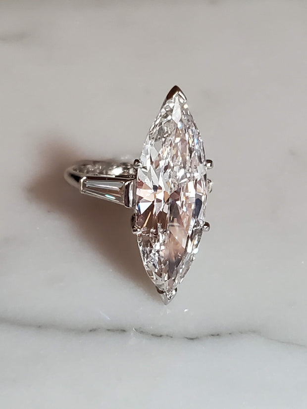 7.22ct Natural Marquise Diamond Set in a Platinum Ring with Matching Tapered Baguettes