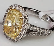 4.03ct Fancy Yellow Oval Natural Diamond in Split Shank Halo Ring