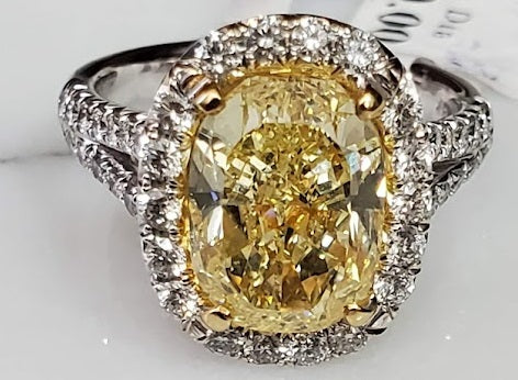 4.03ct Fancy Yellow Oval Natural Diamond in Split Shank Halo Ring